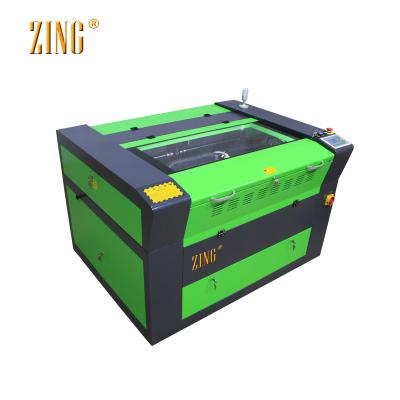 China Laser CUTTING laser engraver machine for silicone wristbands with best price for sale