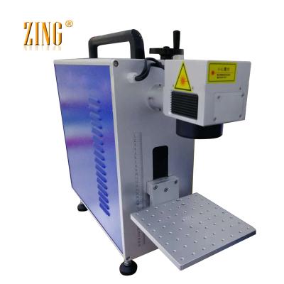 China Marking Product 20W 30W 50W Mini Fiber Laser Marking Machine Portable Laser For Metal for sale