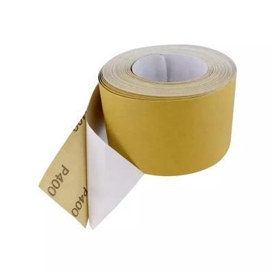 China Sharper and more wear resistant Used for Automotive and Woodworking PSA Stickyback Paper Sand Self Adhesive Yellow Gold Rolls for sale