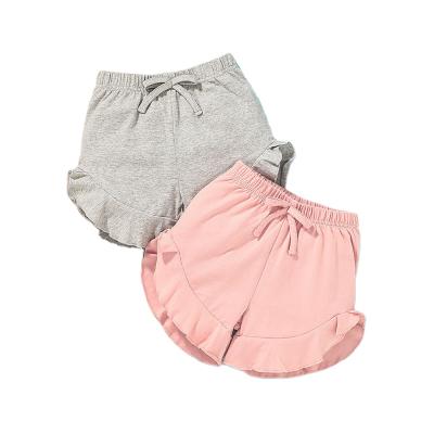 China New Summer Breathable Toddler Short Pants For Girl Gray Pink Solid Ruffle Elastic Sports Shorts Loose Kids Clothing for sale