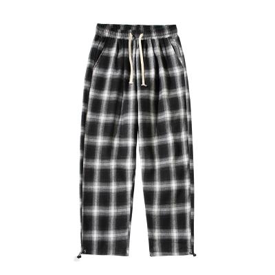 China Korean version of men's plaid Anti-wrinkle pants men's loose straight striped cotton pants casual rope-pull shorts pants wholesale for sale