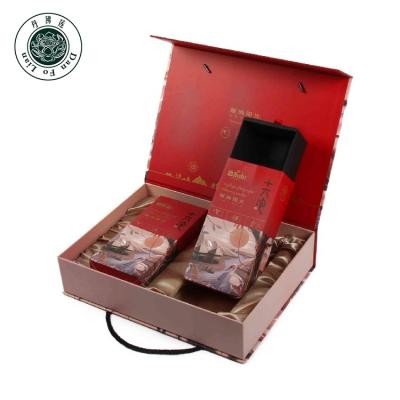 China Handmade Wholesale Rigid Cardboard Magnetic Boxes Hinged Tea Creative Magnetic Packaging Box With Handle for sale