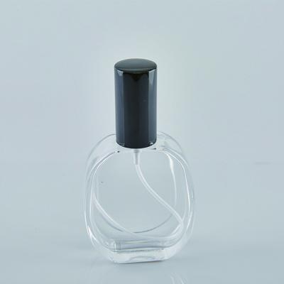 China Popular 50ml Cosmetic Custom Design Empty Glass Perfume Oil Bottle With Black Color Cap for sale