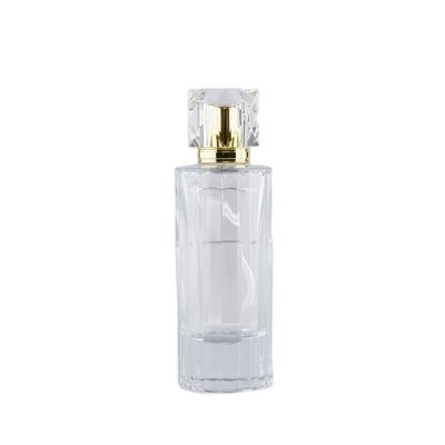 China Cosmetic Flat Shoulder 50ml Thick Bottom Glass Perfume Bottle With Pump Spray And Clear Lid for sale