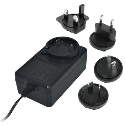 China 24V 2.5A Interchangeable Plug Power Adapter 12V 24V 1A 500Ma 2.5A AC DC Power Adapter 24 Volt DC 2.5A Power Supply 86.8*50*33MM for sale