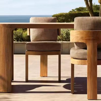 China Alta gama impermeable de teca mesa de comedor al aire libre y sillas patio jardín conjunto de madera de suelo en venta