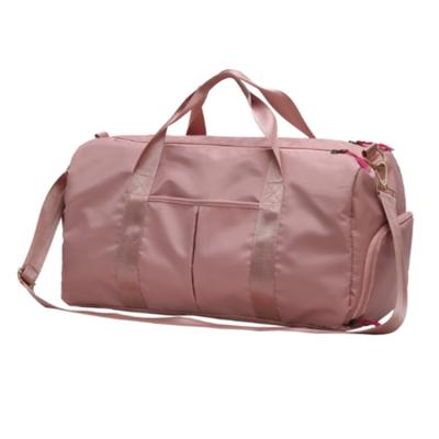 China Outdoor Customized Logo Large Capacity Pink Duffle Durable Cubes Travel Tote Weekend Bags Gym Man Women Waterproof Sports Travel Bag for sale