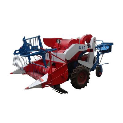 China Newest Rice Factory Price Mini Combine Harvester Wheel Type Rice Harvester for sale