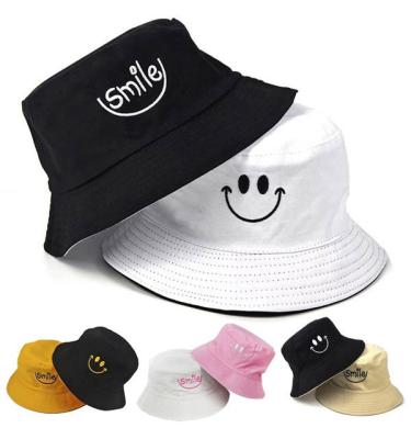 China COMMON New Design Custom Reversible White Designer Fashion White Bucket Hat With Custom Logo for sale