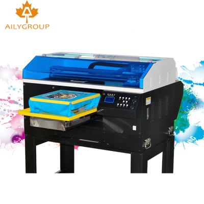 China Garment Shops Container Hottest Price Design Digital T-shirt Flatbed Printing Machine For Sale for sale