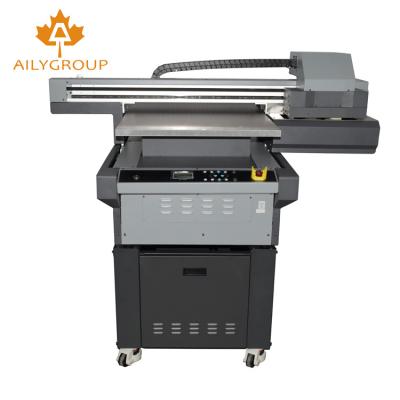 China Garment Shops Cheap 60x90 Cm UV Flatbed Color Printers for sale