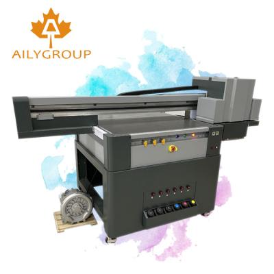 China Hotels New Small UV Flatbed Printer 9060 Format UV Flatbed Printer for sale