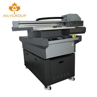 China Garment shops 3 head small size dx8 dtg uv led digital flatbed printer for sale