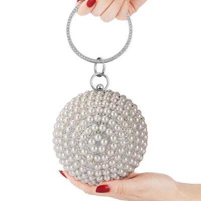 China Luxury Full Rhinestone Ring Handle Purse Pearls Evening Bag Women's Round Clutch Ball Handbag for sale