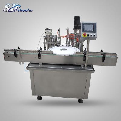 China Food Boston Round Bottle With Dropper Automatic 30ml 60ml MCT Filling Line Fractionated Coconut Oil Filling Capping Machine for sale