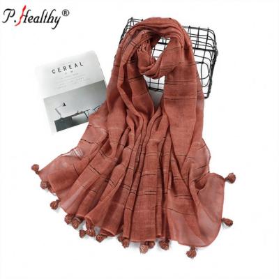 China Sale Factory Price Plain Dyed Hot Simple Squishy Hijab With Tassel Head Wrap Arab Women Scarf Wholesale for sale