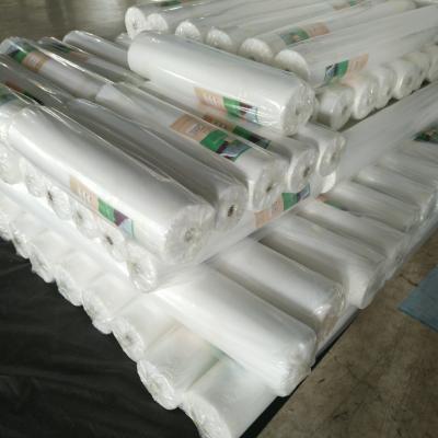 China Anti-bacteria non woven plant pp woven fabric agriculture cover bag non woven fruit farming protection bag for sale