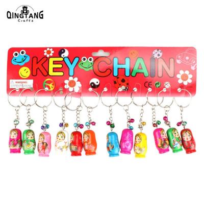 China 12 styles/mixed wooden matryoshka doll keychain style key chain toy with small bell for sale