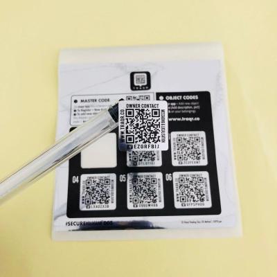 China OEM waterproof roll up double layer paper label, waterproof glossy adhesive qr code label paper sticker for sale