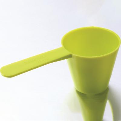 China Custom Green Stackable Long Handle Scoop PP Reusable Plastic Measuring Spoon 70ml 35g Viable for sale