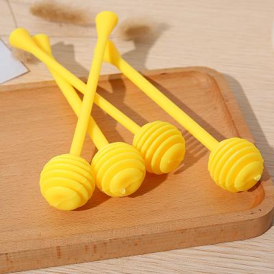 China Viable Wholesale Bee Honey Dipper Honey Dispenser Stick Honey Spoon Scoop for sale