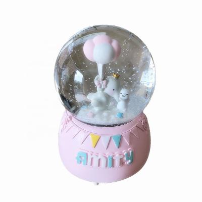 China Cute Europe Girl Birthday Gift Resin And Glass Snow Globe for sale