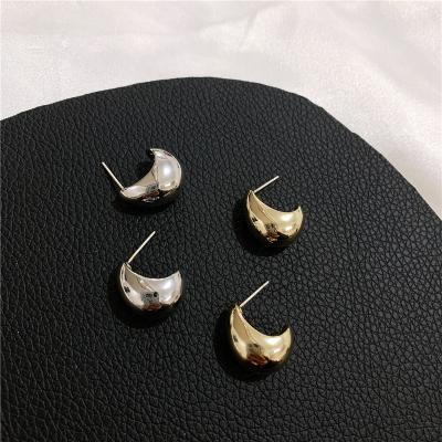 China Simple and elegant French cold wind C-shaped hollow U curved surface earrings metal earrings for sale