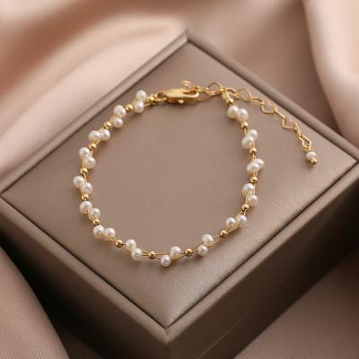 China Small/Sporty Freshwater Pearl Gold Casual Soft Natural Wire Woven Fancy Bracelet On The Wrist Women's Temperament 14K Gold Simple Package for sale