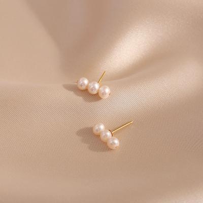 China 925 simple and small ISI soft natural pearl fashionable smart women's earrings silver temperament cold wind needle earrings for sale