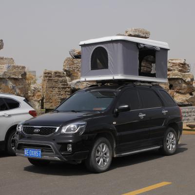 China Camouflage/Field Game 2021Hard Shell Car Roof Top Tent Truck Roof Top Folding Camping Tent for SUV for sale