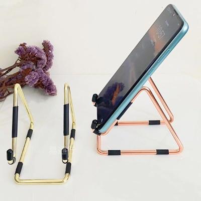 China Compatiable with ipad Phones Accessories Show Mobile Phone Stand Smartphone Holder Gold Metal Wire Mobile Phone Desktop Holders for sale