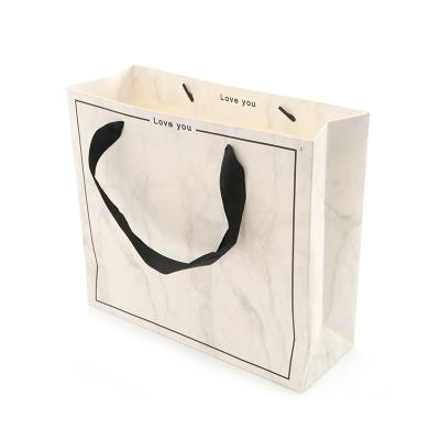 China Recyclable paper bags for shopping bag with logo takeway paper custom bag packaging bulk custom size for sale