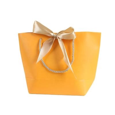 China Recyclable Custom Personalized High Quality Apparel Package Bags Craft Garment Paper Product Bags for sale