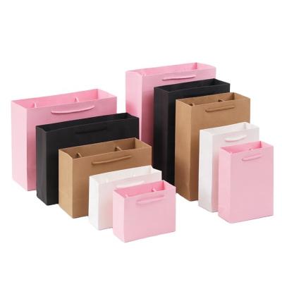 China Recycled Materials Wholesale Custom Paper Bags Gift Handbags Clothing Store Bags Printed Logo High End Shopping Thickened Kraft Paper Packaging for sale