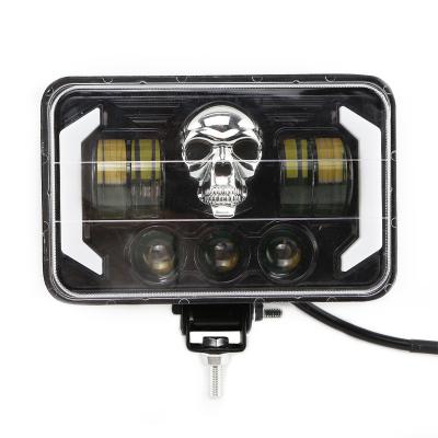 China PC+Aluminum 5 Inch Cowboy Car LED Headlight Cross-country Modified Skull Sky-and-Land Beam Motorcycle Headlight for sale