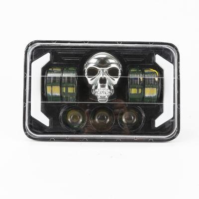 China PC+Aluminum 5 Inch Cowboy Car LED Headlight Cross-country Modified Skull Sky-and-Land Beam Motorcycle Headlight for sale