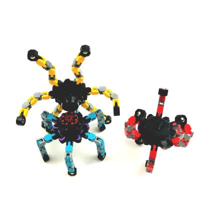 China Funny Release Toy Children Creative Mechanical Fingertip Stress Spinner Toy Custom Deformable Robot Spinner Toy for sale