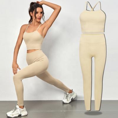 China Modern Design Breathable Leisure Backless Yoga Sports Seamless Bra And High Waist Gym Fitness Gaiters Suit Sportswear Set for sale