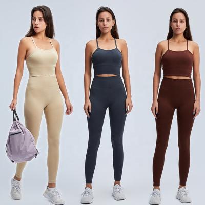 China Hot Sales Breathable Customized High Waist Seamless Back Cross Stitch Sporty Yoga Sets Fitness Women Gym Wear 2 Piece Tank Top Bra Panty For Girl for sale