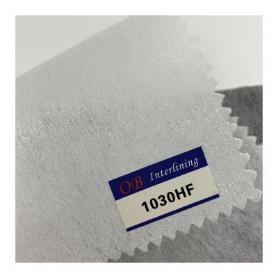 China Custom Fusible Bukram Interlining Fabric Chemical Bond Circular Fusible Interlining for sale