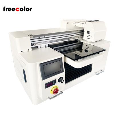 China Indoor Outdoor Advertising Freecolor High Resolution 1440dpi A2 Brand Plus UV Flatbed Printer Pen Ball Gifts Printing Machine for sale