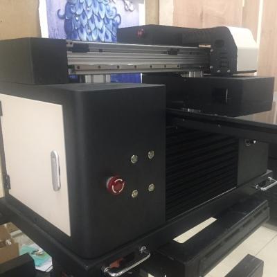 China Retail Small A3 Size Digital UV Led Flatbed Printer for sale