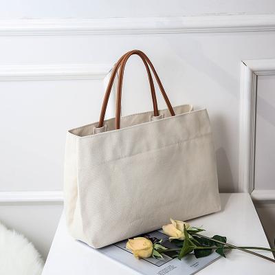 China Wholesale Large Capacity Korea Design Beach Canvas Shoulder Tote Bag Women Large Shoulder Handled Handbags for sale