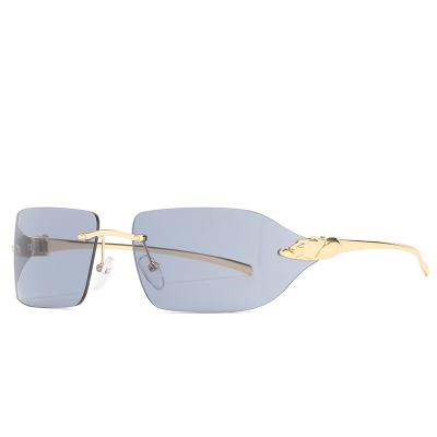 China Fashion Sunglasses 2022 Luxury Men Sun Glasses New Leopard Fashion Women Metal Rimless Main Lens for sale