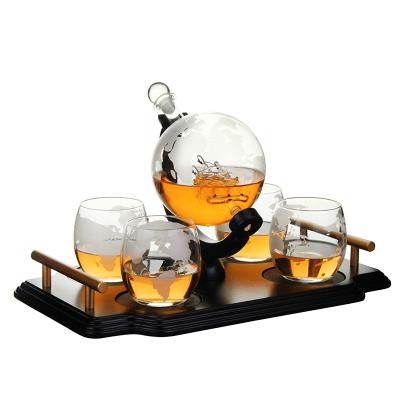 China CLASSIC Hot Selling 28 oz Whiskey Ball Decanter with Antique Boat and Matching Ball Glass Bar Funnel and Wood Base for sale