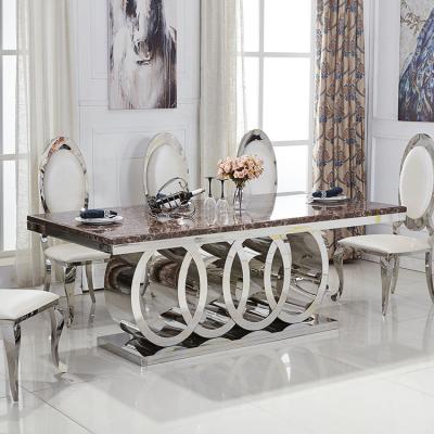 China Moq solid luxury marble dining table European low style furniture stainless steel low dining table for sale