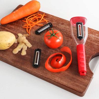 China Sustainable Kitchen Stainless 3 in 1 Carrot Peeler Multifunctional Manual Veggie Peeler Potato Cucumber Vegetable Peeler with Storage Box for sale