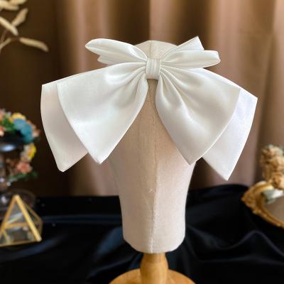 China YK2356A Comfy Bridal White Satin Bow Hairpin Wedding Photo Side Headdress Travel Shape Hairpin Elegant Hairpins for sale