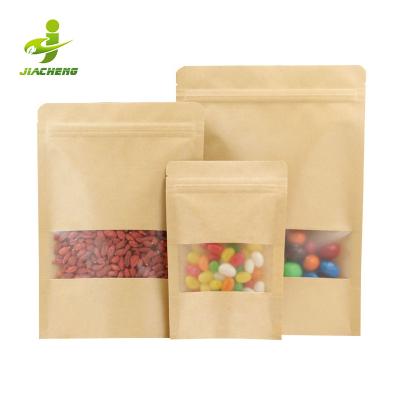 China Recyclable Wholesale Cheap Recycled Nuts Packaging Pouch Brown Kraft Paper Zipper Bag With Window for sale