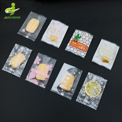 China JIACHENG food grade disposable opp heat sealed center seal small transparent clear cellophane bolsas media de lados middle seal bag for sale